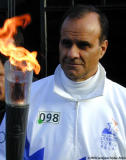 NY Yankee Manager: Joe Torre runs with the Olympic Torch in Brooklyn, New York