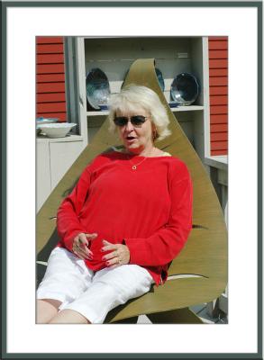 At Edgecomb Potter's Michaele tries out the leaf chaise. She DOESN'T find it comfortable!