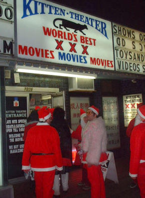 Santa attempts to catch a little porn but admittance is denied.
