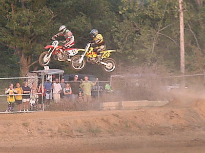 Josh's friends jumping at JC fair MX 7-31-00