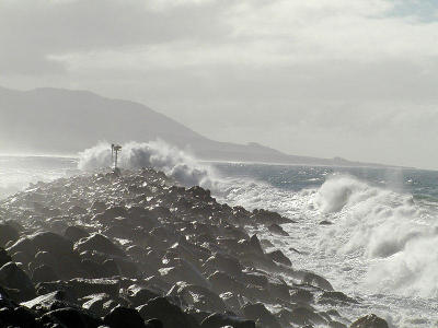 The breakwater pounded and wet