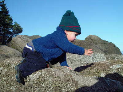 Child on Rocks by Sea (Exhibition), by Howdy (F707)