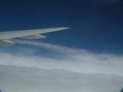 Wing and clouds