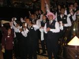 Waiters singing for the guests