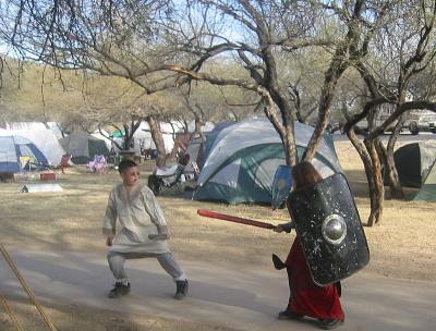 Joey's and Lars' kids fighting/playing