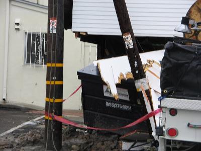 the old power line pole was broken at the base and near the top. The SBC power crews worked thru the night till 8am