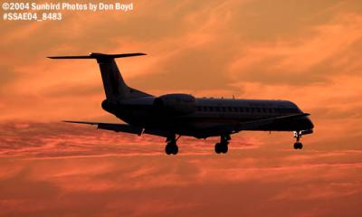 American Eagle Embraer Regional Jet sunset aviation stock photo #8483
