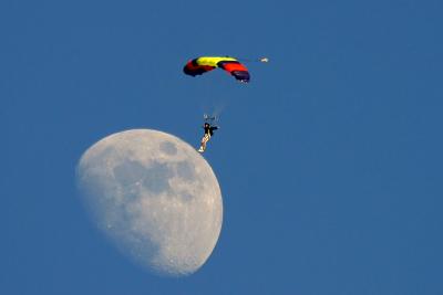 Skydiver crosses the moon without knowing it. (NO digital manipulation)