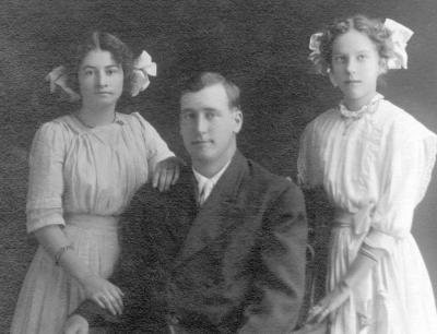 Nellie Gladys (daughter of Elizabeth Jane Kimes), Thomas Leander Kimes, & Iris Kimes (daughter of William Sherman Kimes).jpg