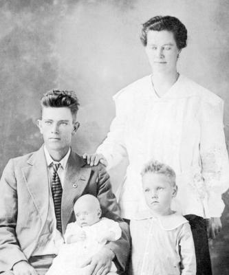 Loransie Dowe (son of William L. D. Coatney), Sylvine, Vearl Ky, & Raymond Dowe Coatney.jpg