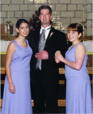 Dennis & his girls.jpg