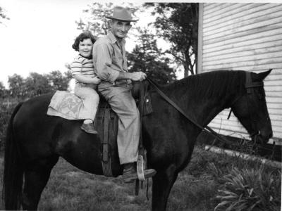 Elizabeth on Horseback with Grandpa Lambert in Missouri