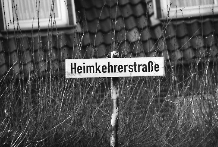 Homecomers Street - Friedland Processing Center