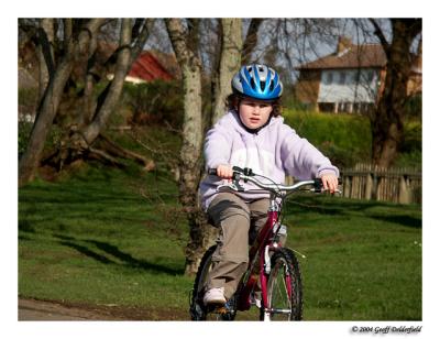 girl on bike at lakegrounds