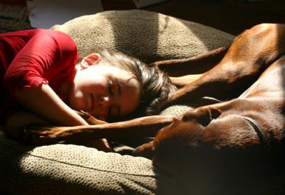 A girl, her dog, and a lazy Sunday afternoon.
