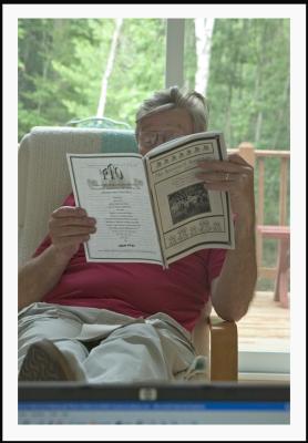 While everyone naps, Ron reads to Roosevelt News.