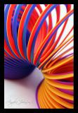 <B>10th Place (tie)</B><BR><i>Slinky<br>by Angela Johnson</i>