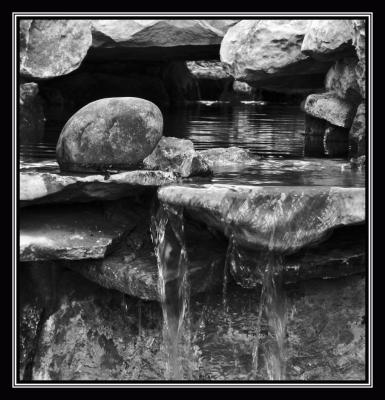 bw waterfall rocks from front with border