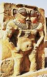 Temple de Denderah sculpture du dieu Bs
