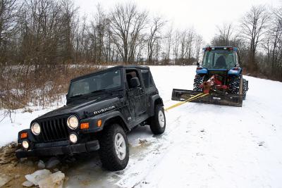 The tractor  was spinning his wheels in this pic, no traction on the ice.