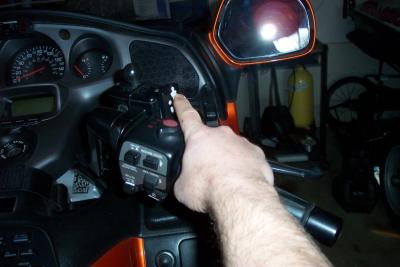 Easy reach to garage door opener while riding.