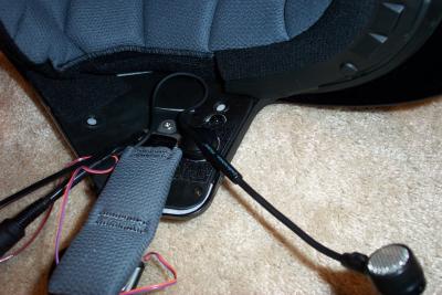 You then thread the tail of the zip tie through the head of the zip tie on the headset connector as shown