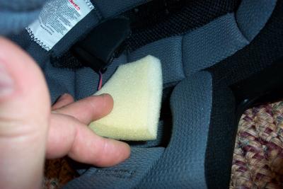 Inserting foam spacer into helmet.  Your helmet may not need these depending on how much space they have for the speakers
