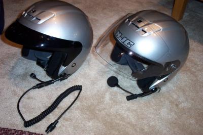 Here is a photo of both helmets with headsets installed.