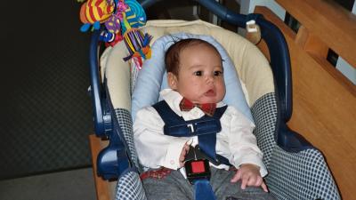 Evan, all dressed up to be taken to his baptism