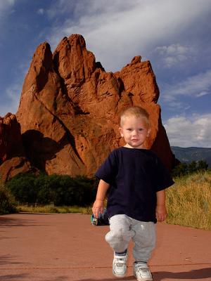 Archive from Summer
It snowed today and is gray, overcast, and cold.  I thought I would dig up a shot from summer.  I found this one of Ethan from August 2003 at Garden of the Gods in Colorado Springs.