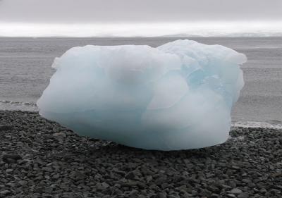 Beached blue ice growler.