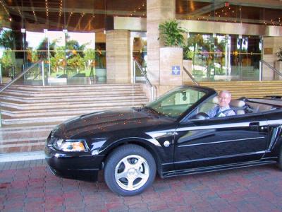 Jim in Mustang Convertible rental car