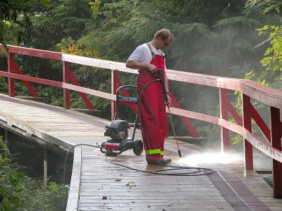 Steve power washing boardwalk to foghorn