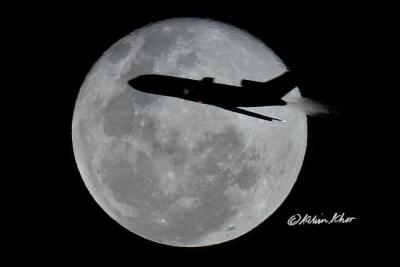 Plane over moon.jpg