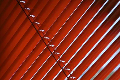 red blinds, blue sky