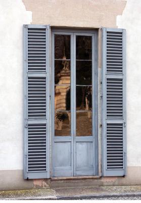 Antique window reflection in Villa della Porta Bozzolo