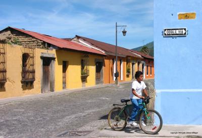 street with blue wall, antigua, guatemala