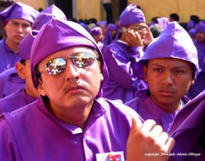 sunglasses in the procession, antigua, guatemala