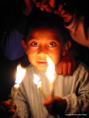 boy with candles, guatemala