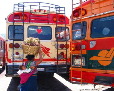buses with woman, antigua, guatemala