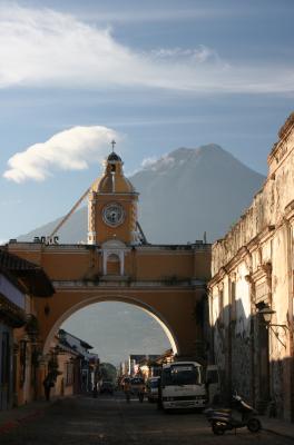 Arco de Santa Catalina and a volcano in the background
