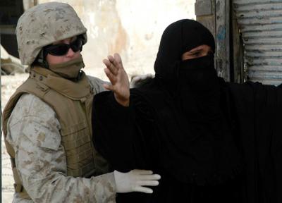 Iraqi woman patted down