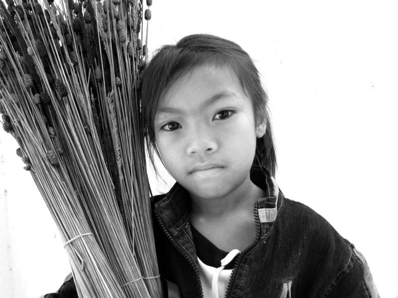 Child with Offerings, Vientiane, Laos, 2005