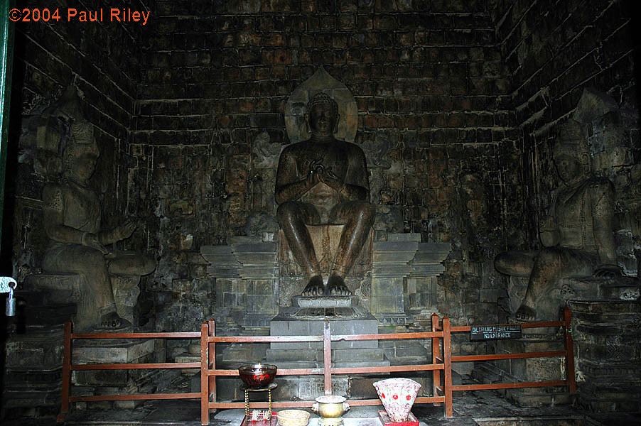 Mendut Temple - Buddha and Lokesvara left and Vairapana right