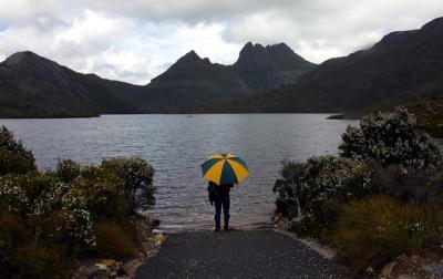 Umbrella man at Cradle Mountain and Dove Lake