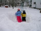 Sarah and Kyle adding the finishing touches to the snow fort