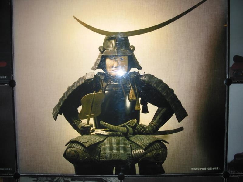 Masumune seated in Samurai Armor