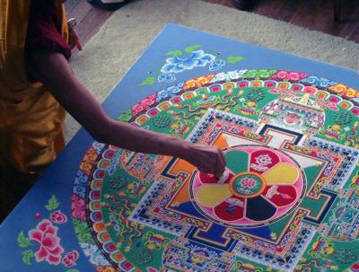 This mandala was created by Tibetan Monks over a 5 day period in 2004.This photo was taken just  before they destroyed it and took the sand to the river. The community had gone through terrible divisions regarding water. The Mandela was to bless our community and heal it.