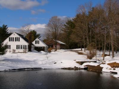 Homestead by a Pond