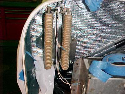 The ballast resistors mounted on the left firewall